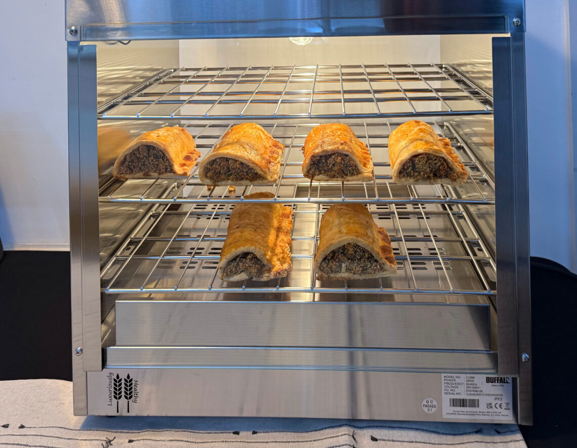 Cumberland sausage rolls in hot display cabinet