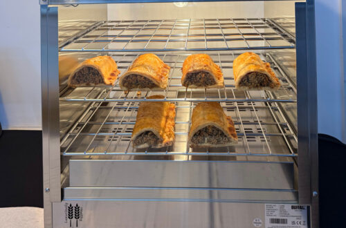 Cumberland sausage rolls in hot display cabinet